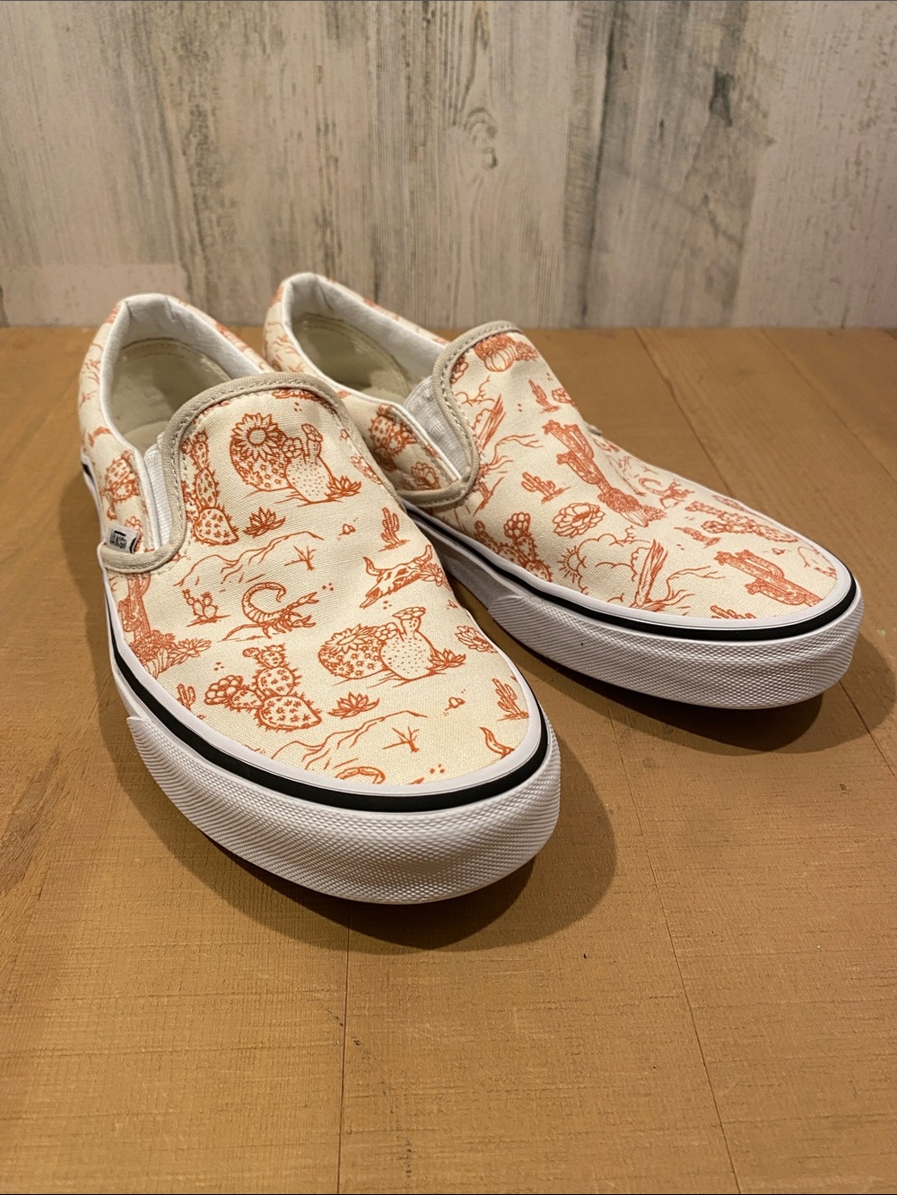 Vans Womens Slip-On Sneakers with a southwest print